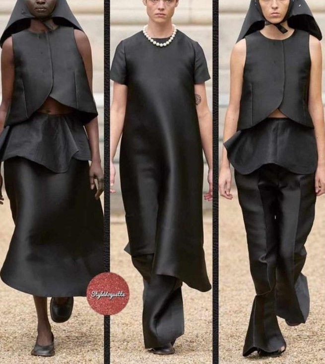 in negru, materiale textile . Tesaturi de evenimente, rochii de seara, bluze, fuste.