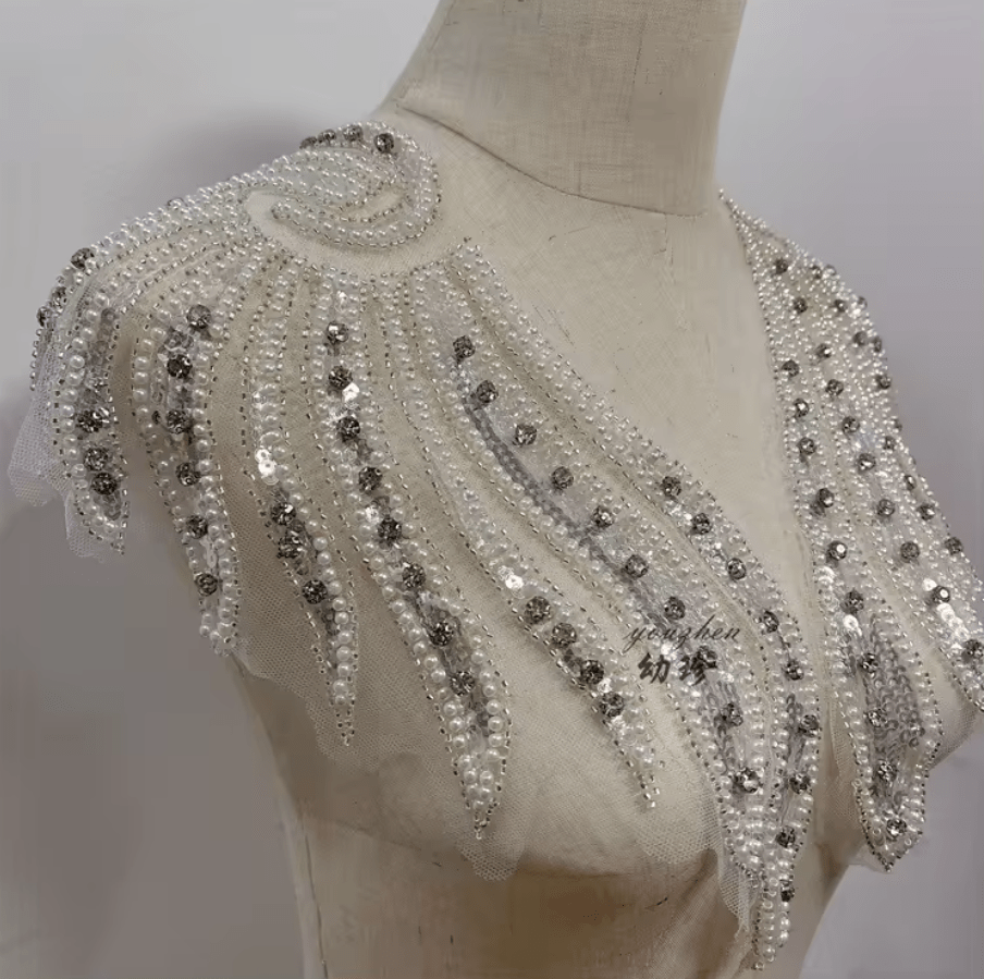 Aplicatii de cusut. Aripi 
