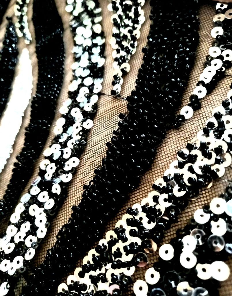 Dantela cu margele si paiete pe negru cu argintiu, lace fabric glass beads, black glass apliques sew. Broderii exclusive. Calitate Superioara. Broderii exclusive.
